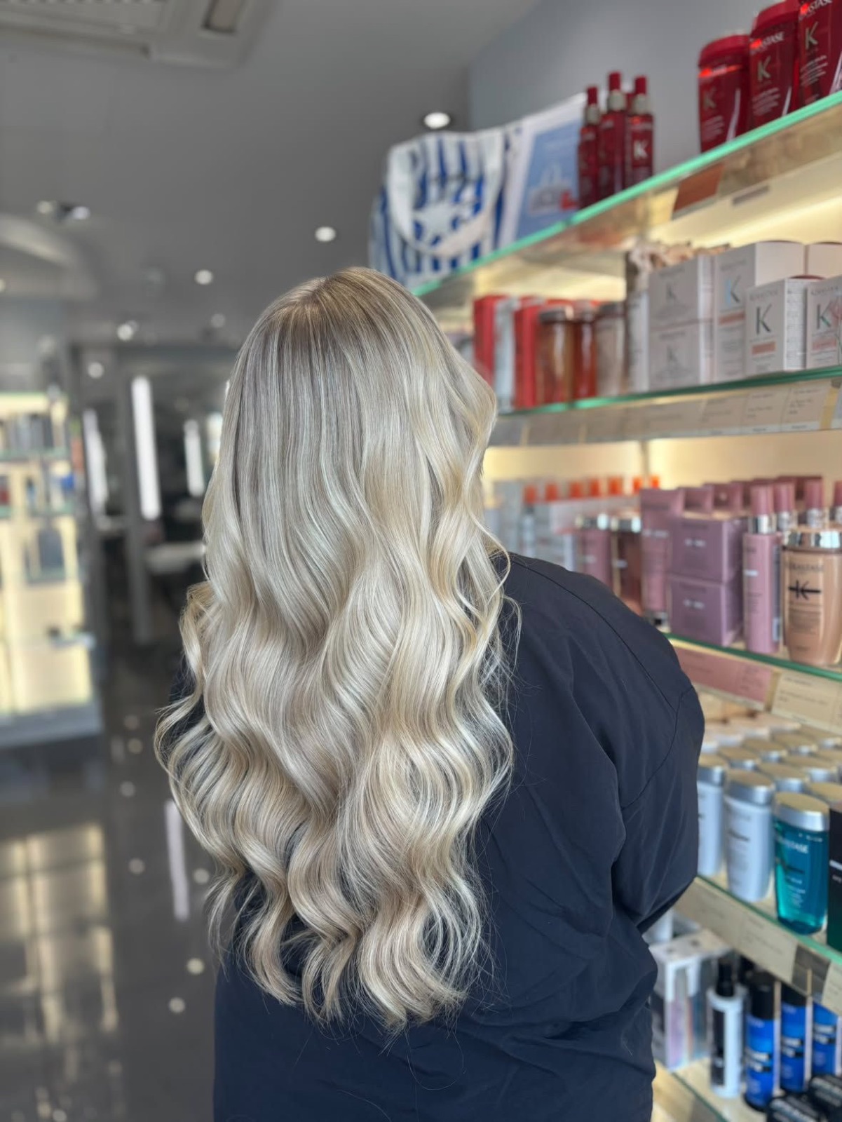 Long pearl blonde hair with soft, glossy waves
