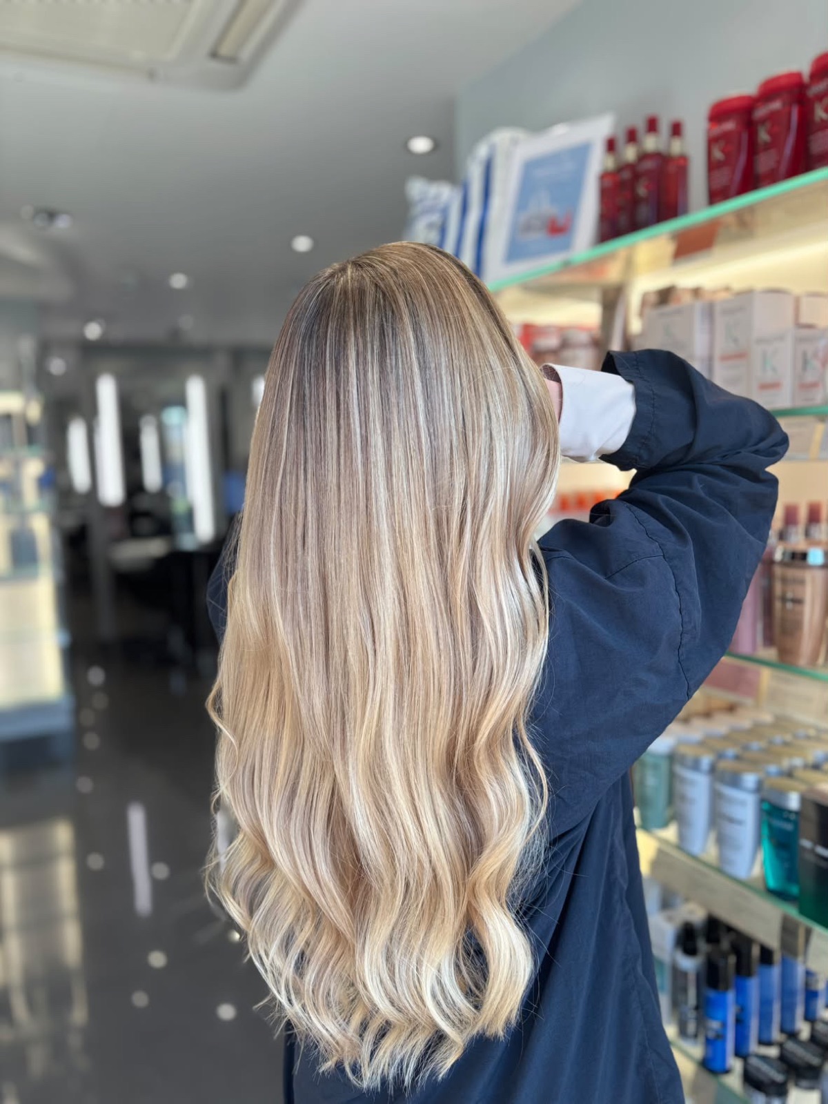 Warm beige balayage with a seamless root blend